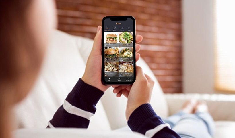 woman using smartphone ordering food